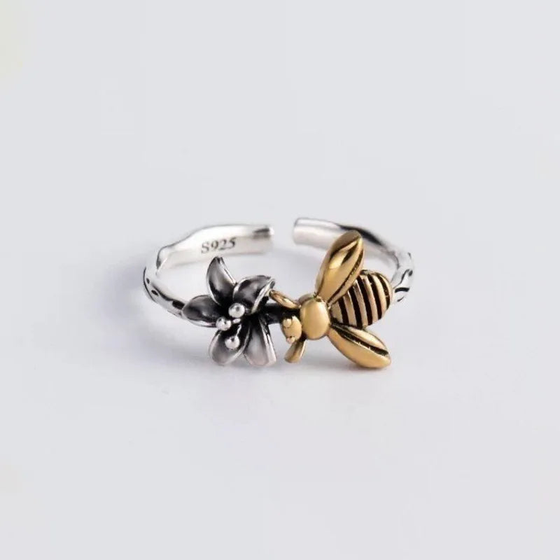 Eleganter Vintage-Ring aus thailändischem Silber mit Bienen- und Blumenmotiv