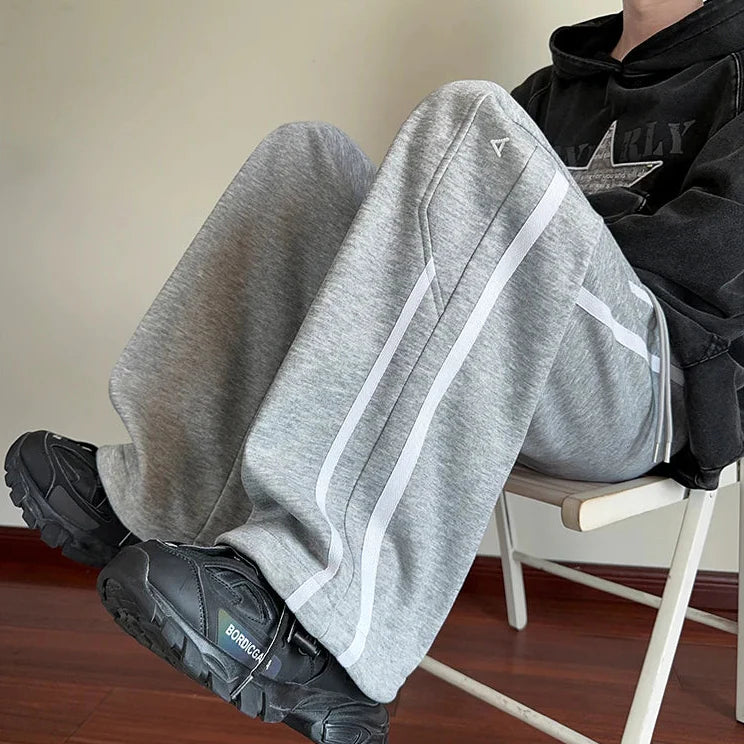 Japanische Jogginghose mit Streifenmuster und weitem Bein
