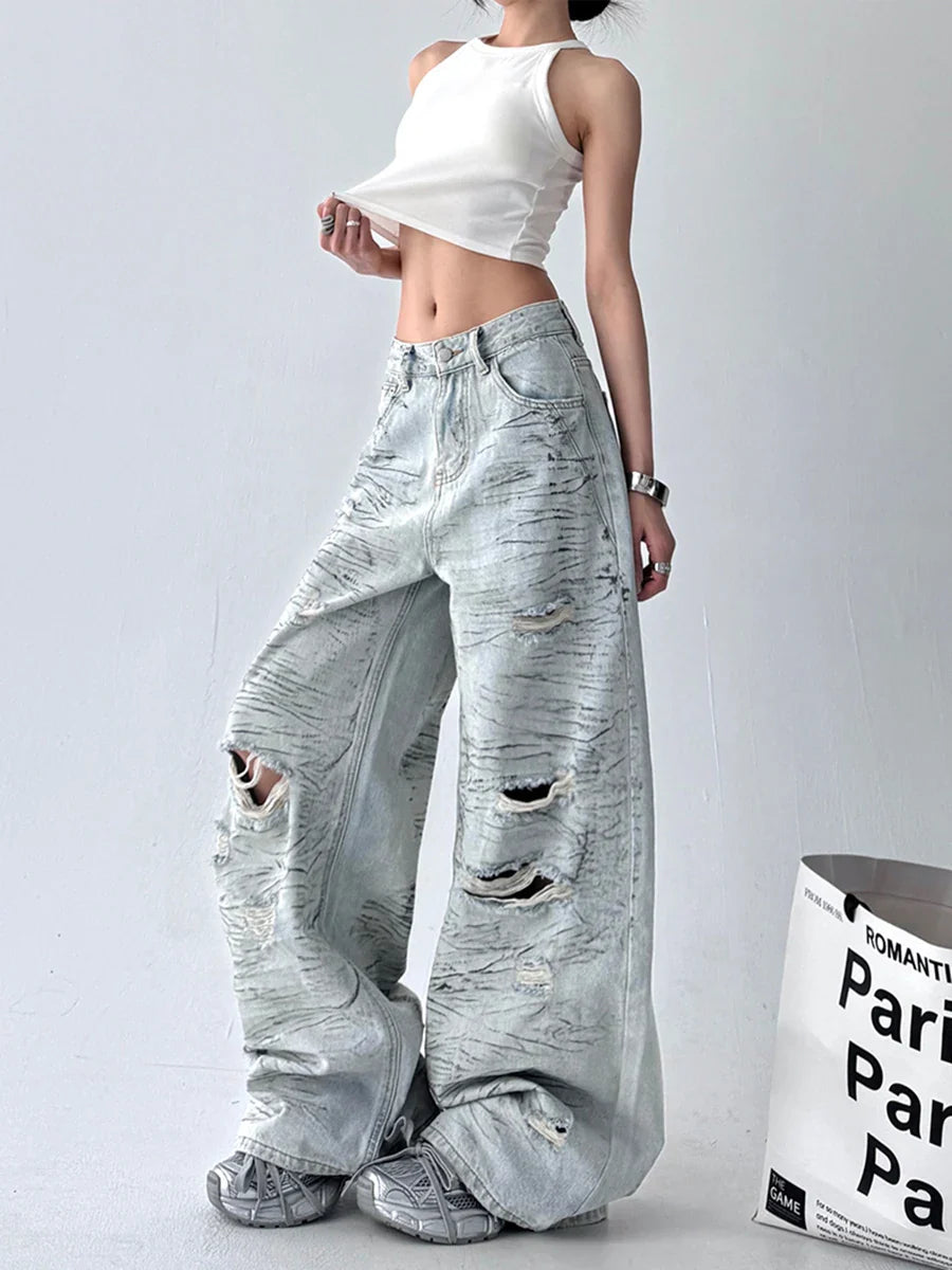 Jean taille haute à empiècements et découpes