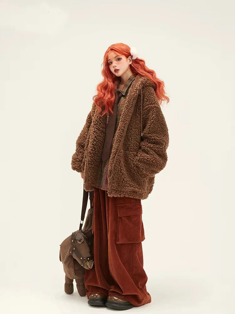 Veste en fausse fourrure épaisse marron représentant un ours