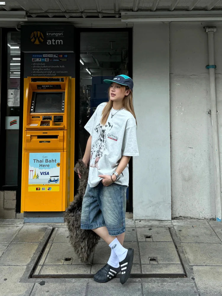 Short en jean bleu délavé arrivant au genou