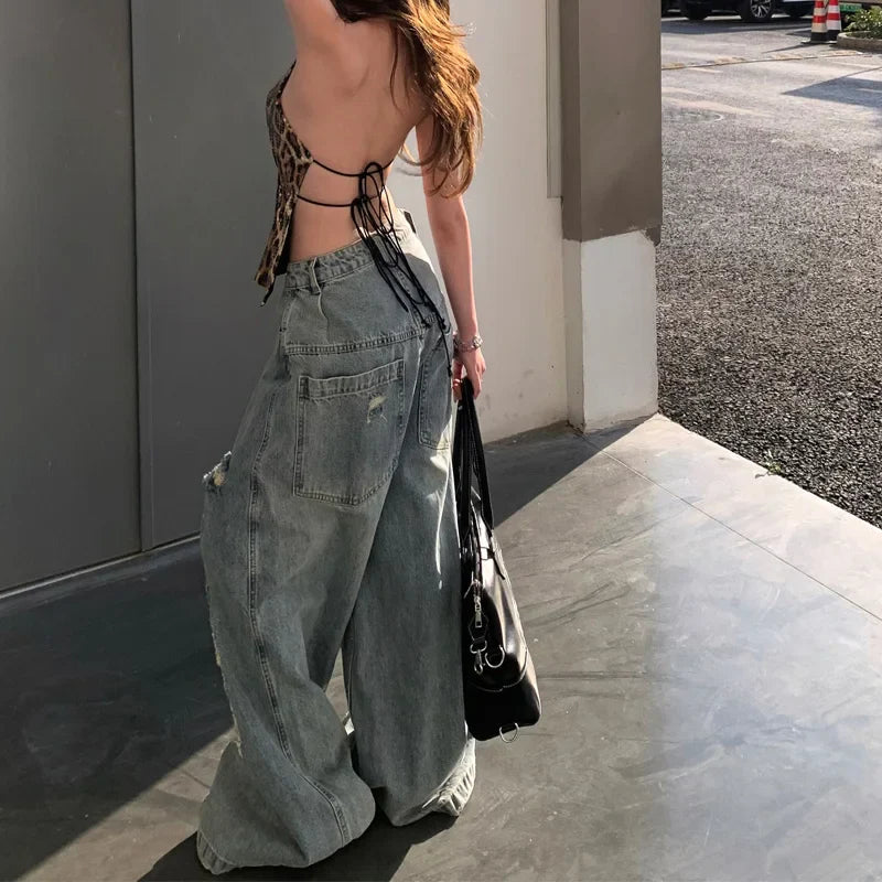 Jean extensible adaptatif à taille haute déchiré