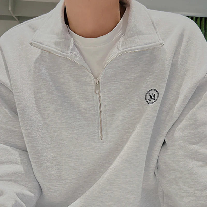 Sweatshirt mit Viertelreißverschluss und Umlegekragen
