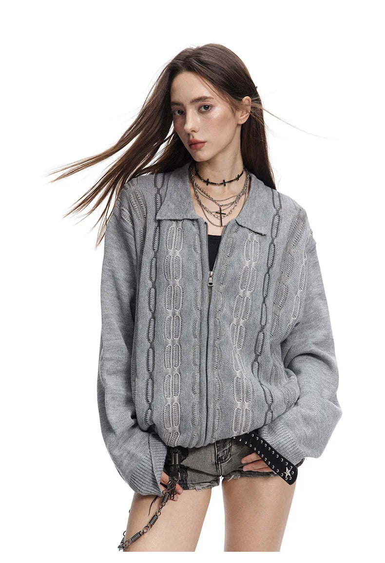 Pull zippé en maille torsadée