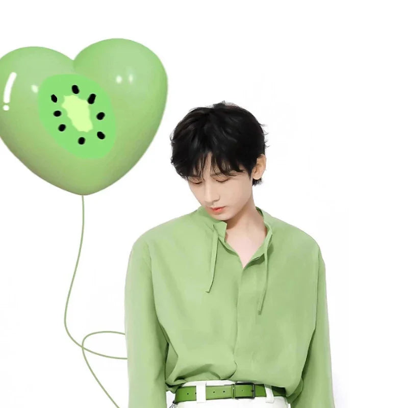Chemise longue verte unie, polyvalente et élégante
