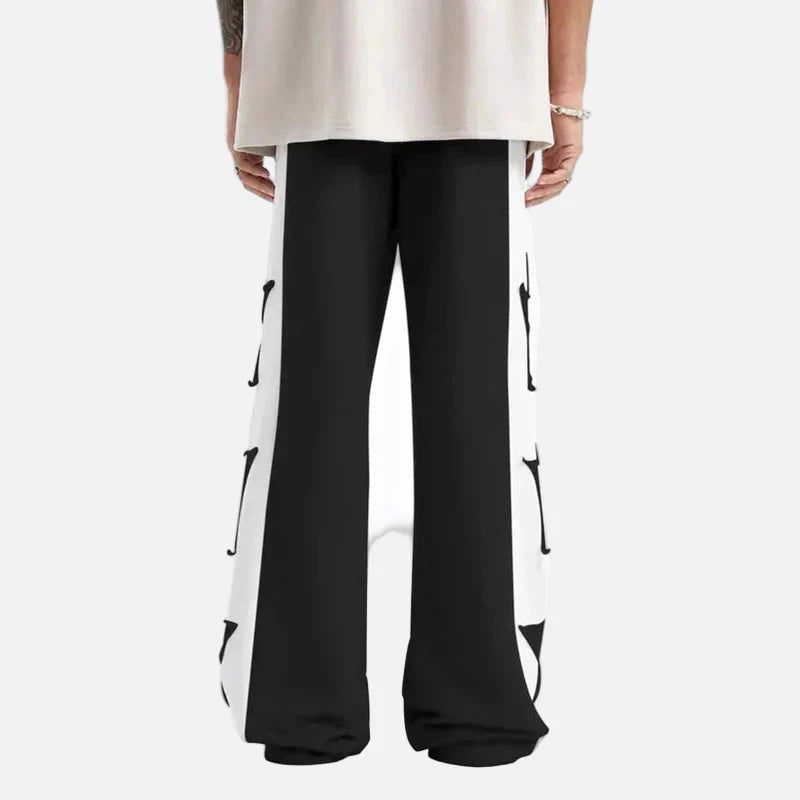 Pantalon de survêtement large à empiècements et blocs de couleur avec étoiles