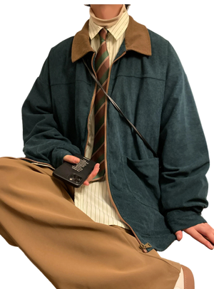 Style yourself in this oversized green corduroy jacket with a contrasting brown collar to add a vintage, textured edge to your daily streetwear rotation.