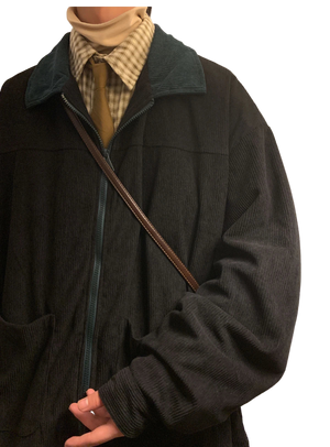 Style yourself in this oversized green corduroy jacket with a contrasting brown collar to add a vintage, textured edge to your daily streetwear rotation.