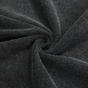 Close-up of dark gray fabric with a textured pattern