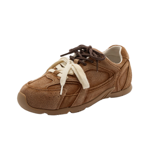 Brown suede sneaker with white laces on a white background