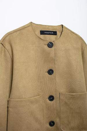 Beige jacket with black buttons on a white background