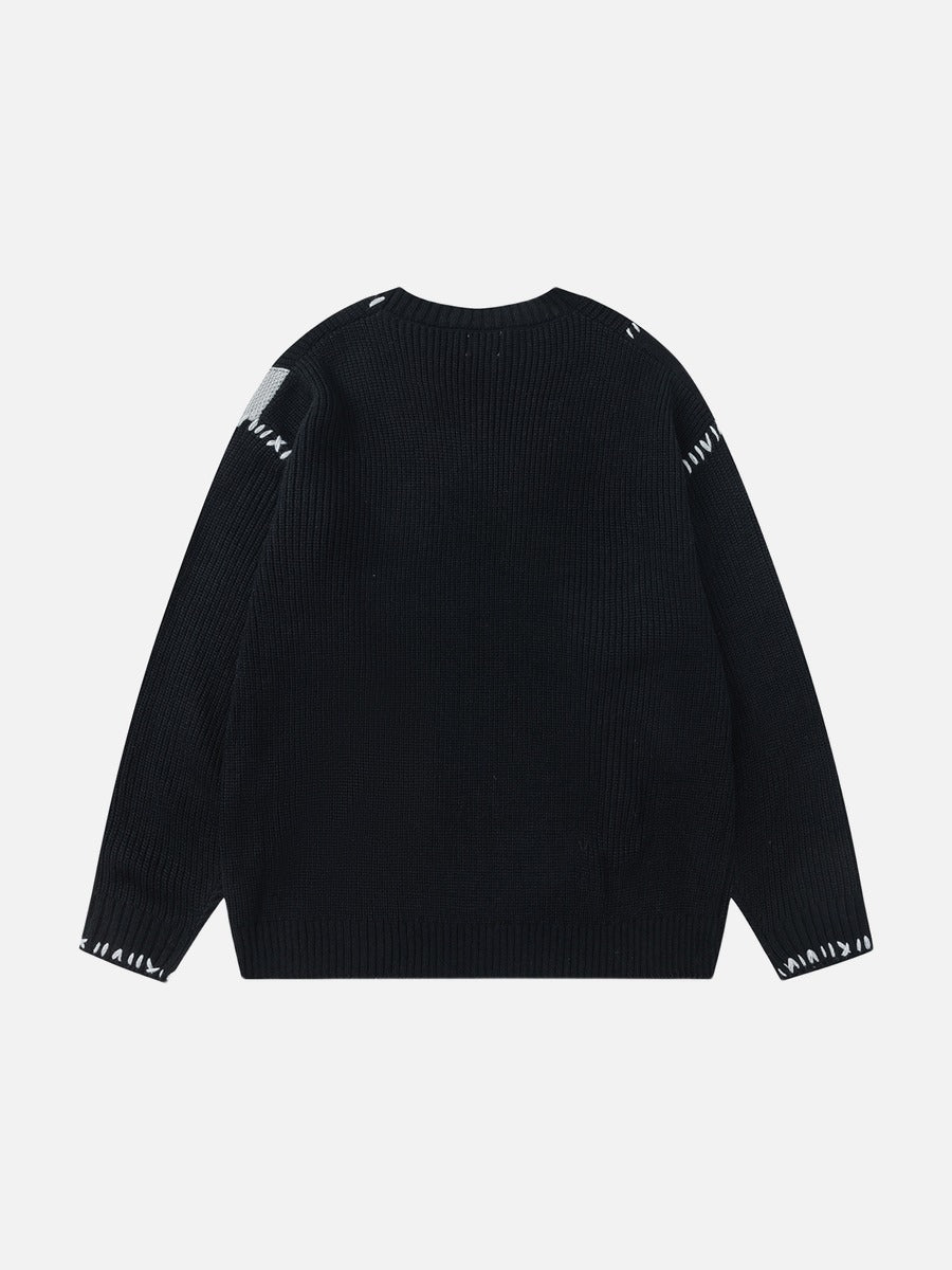 Black Patchwork Knit Sweater with Exposed Stitching