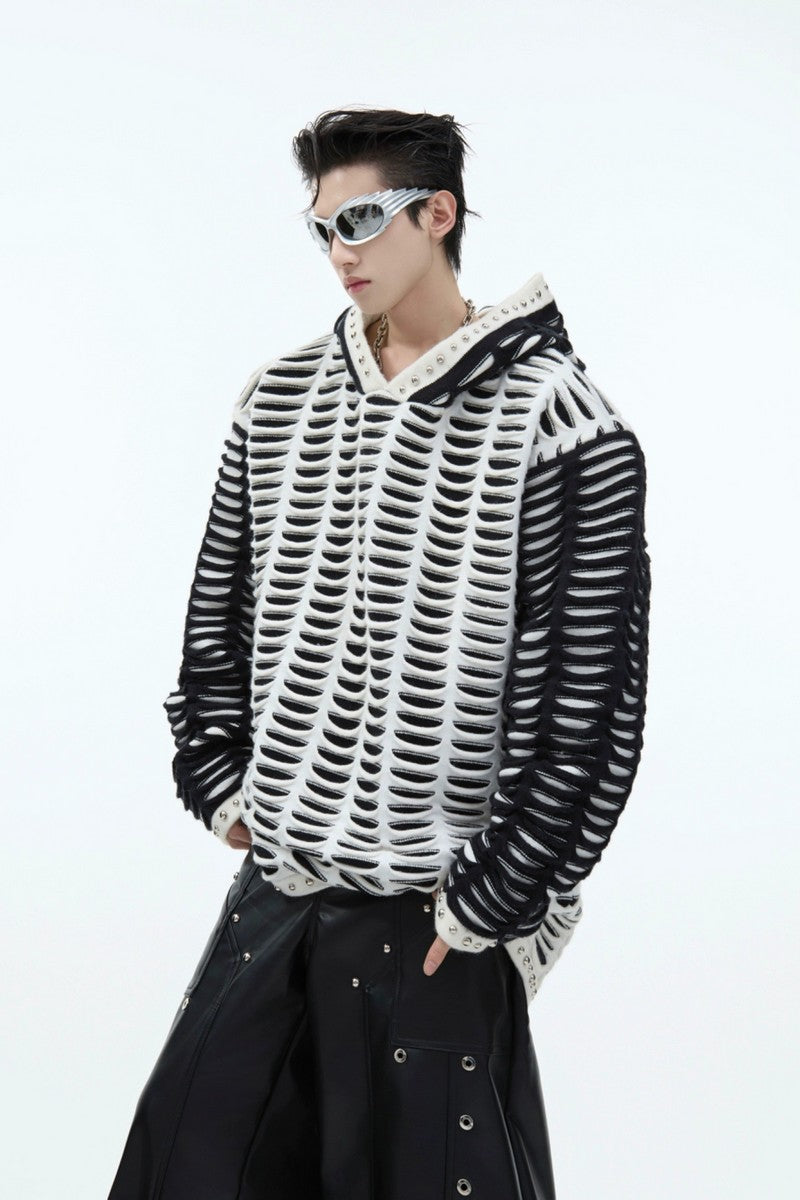Strickhoodie im Used-Look mit Patchwork-Muster und Metallnieten