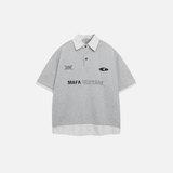 Lässiges Polo-Shirt mit lockerer Passform und angedeutetem zweiteiligem Buchstabenprint