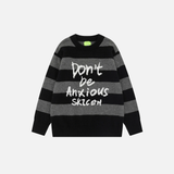 Pull rayé en maille style streetwear hip-hop, un investissement indéniable