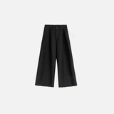 Fließende schwarze Oversize-Hose mit weitem Bein