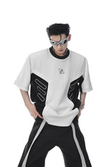 T-Shirt mit Schulterpolstern und Metalllogo 