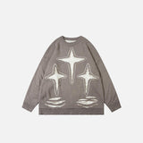 Lockerer Pullover mit Sternenmuster und Rissen