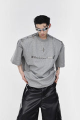 T-Shirt mit Metalllogo 
