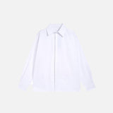 Chemise décontractée ample de couleur unie
