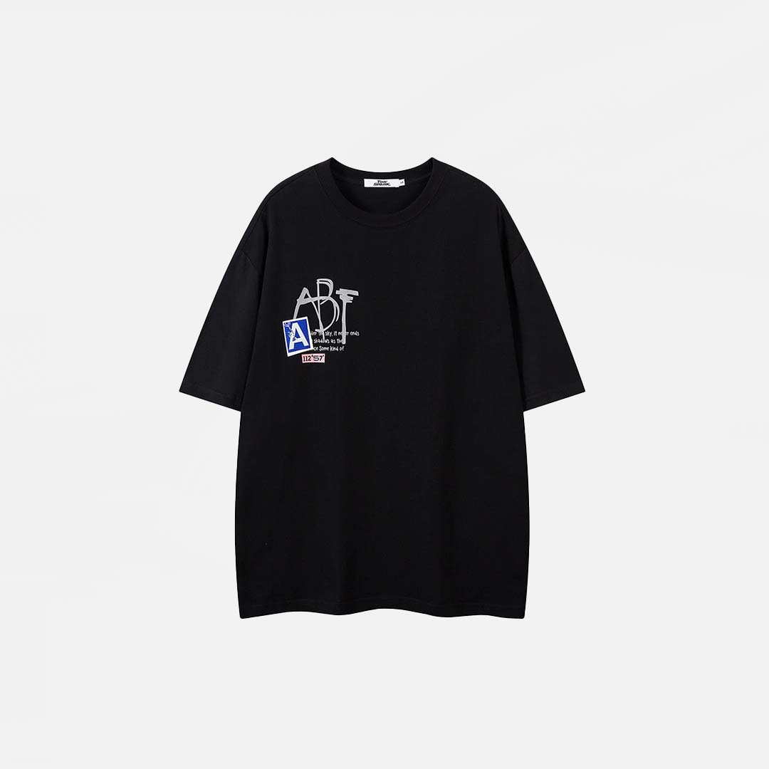 T-shirt à imprimé graphique et alphabet ample
