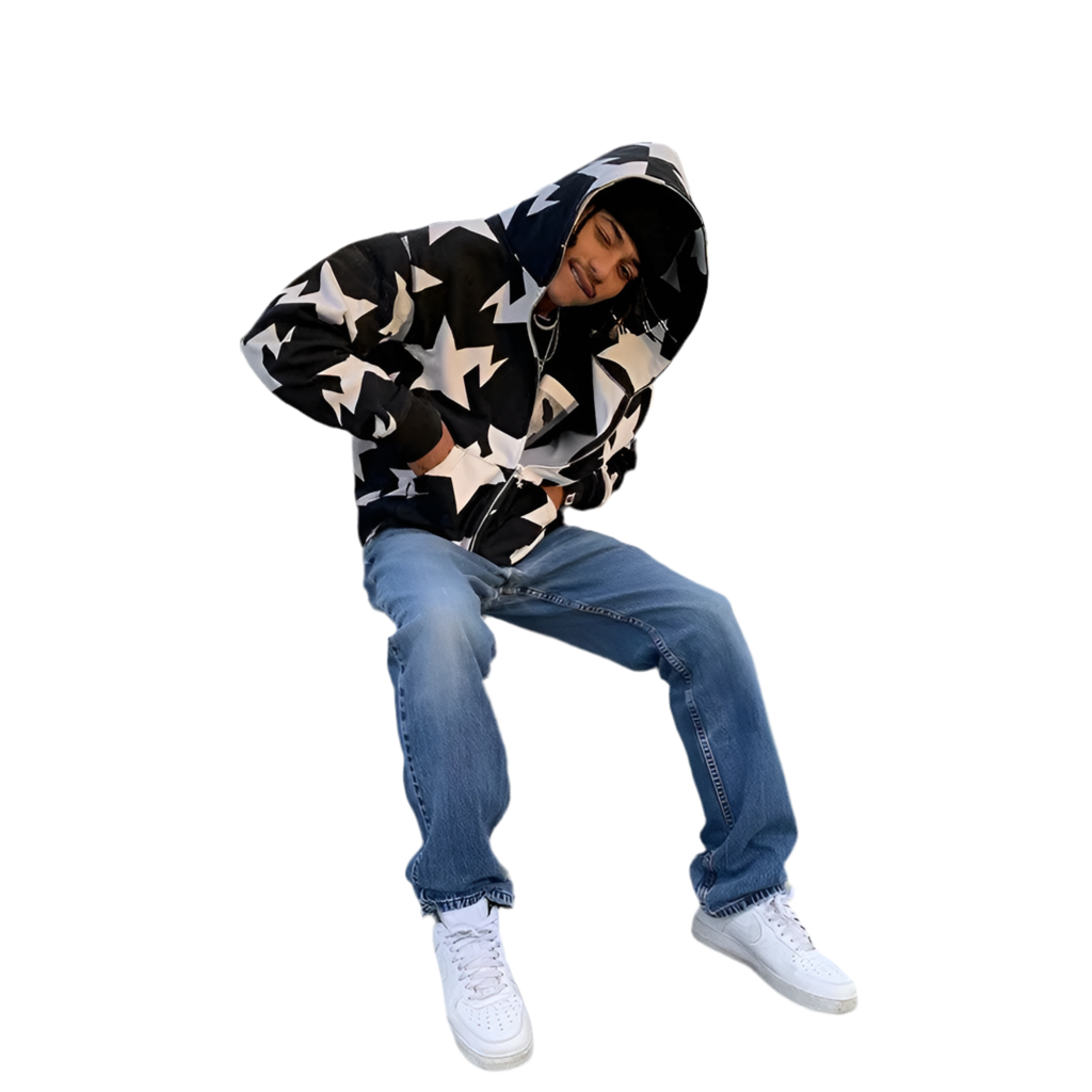 Person wearing a star-patterned hoodie and blue jeans on a white background