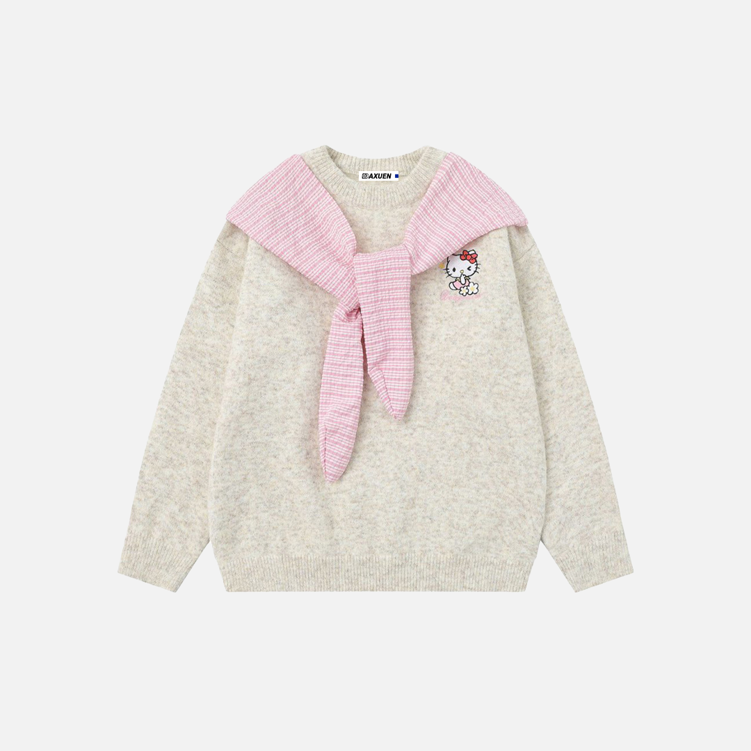 Pull en maille confortable et oversize avec nœud papillon