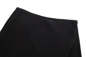 Black fabric with a subtle texture on a white background