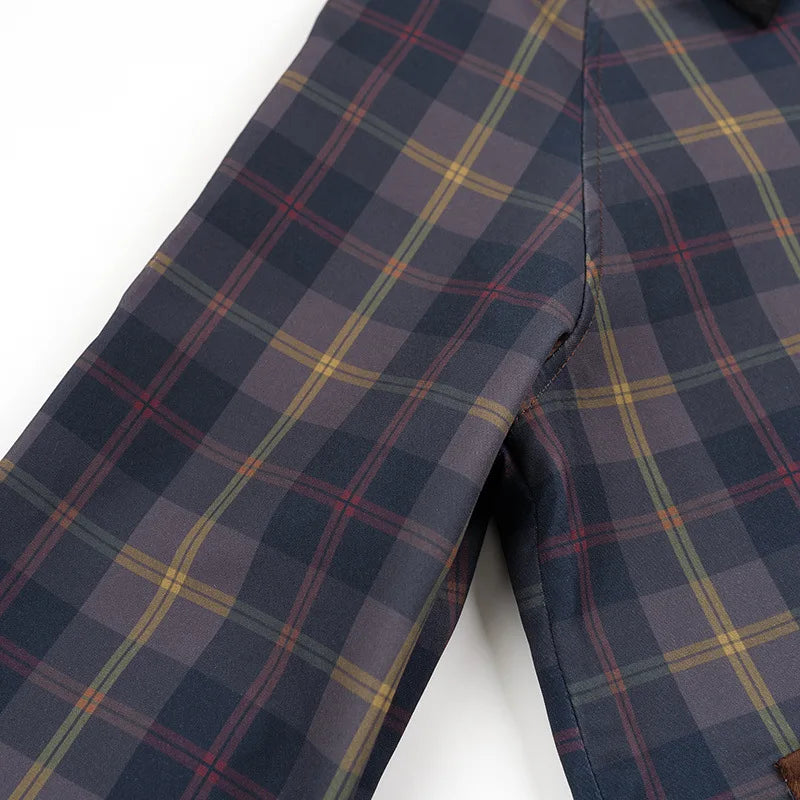 Elevate your rotation with this vintage-inspired plaid workwear jacket, featuring bold contrast panels and a classic tartan check for a standout look.