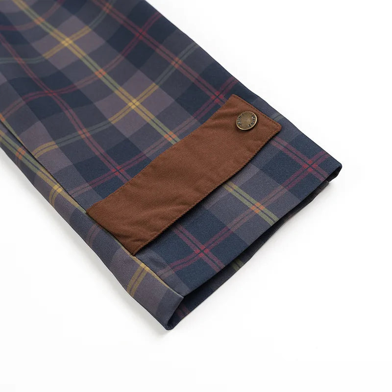 Elevate your rotation with this vintage-inspired plaid workwear jacket, featuring bold contrast panels and a classic tartan check for a standout look.