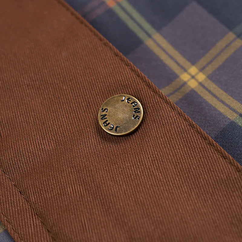Elevate your rotation with this vintage-inspired plaid workwear jacket, featuring bold contrast panels and a classic tartan check for a standout look.
