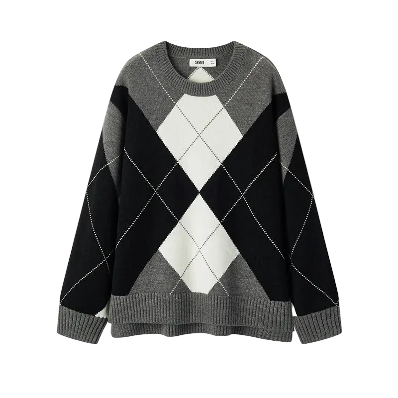 Black, gray, and white argyle sweater on a white background