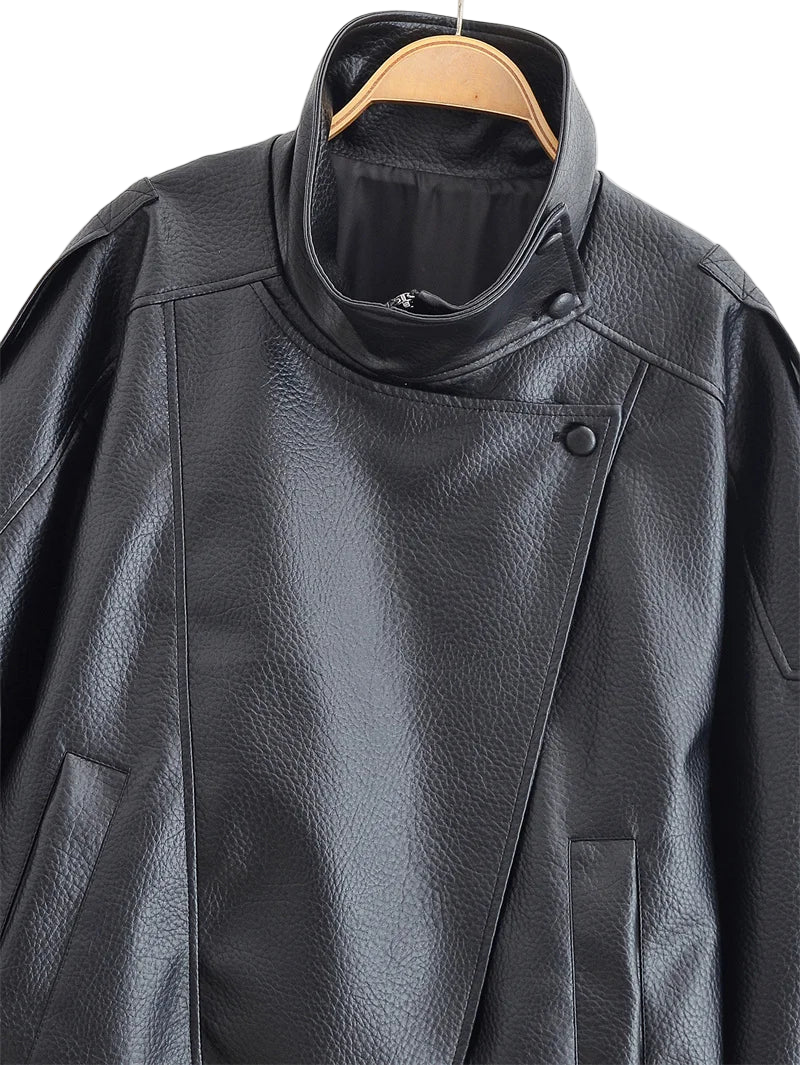 Style yourself in this oversized black leather jacket, featuring a chic high collar and elasticated hem for a sophisticated yet edgy streetwear look.
