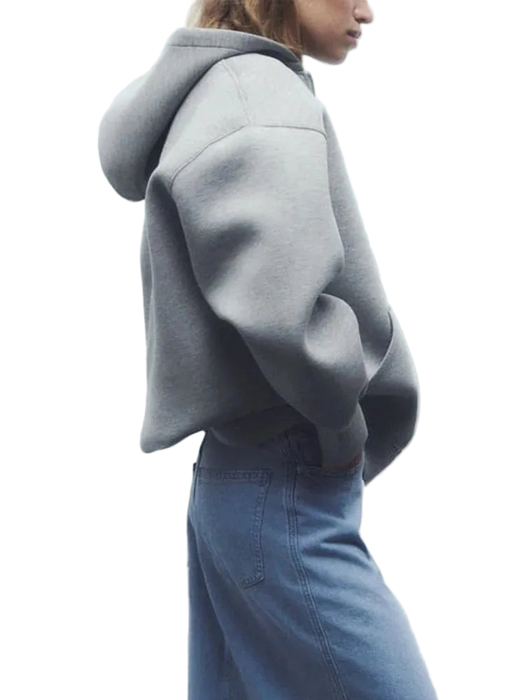 Upgrade your casual wardrobe with this oversized grey zip-up hoodie, featuring a relaxed drop-shoulder fit and ultra-soft fabric for effortless everyday style.