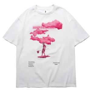 White t-shirt with pink cloud design and text on a white background