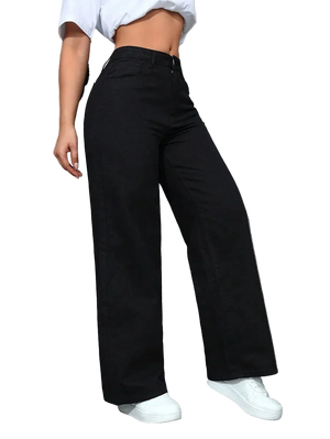 Person wearing black wide-leg pants and white sneakers against a gray background
