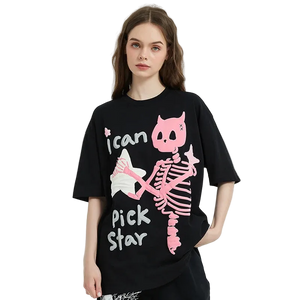 Person wearing a black t-shirt with a pink skeleton design and text on a white background