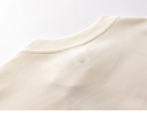 Close-up of a beige fabric texture on a white background