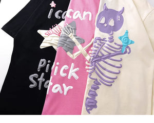 Three t-shirts with colorful designs and text on a white background