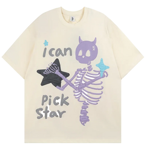 Beige t-shirt with a purple skeleton and star graphic and text on a white background