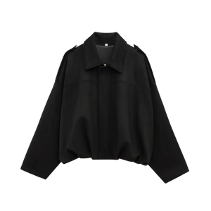 Effortlessly chic and oversized black bomber jacket with sophisticated collar and epaulet details.