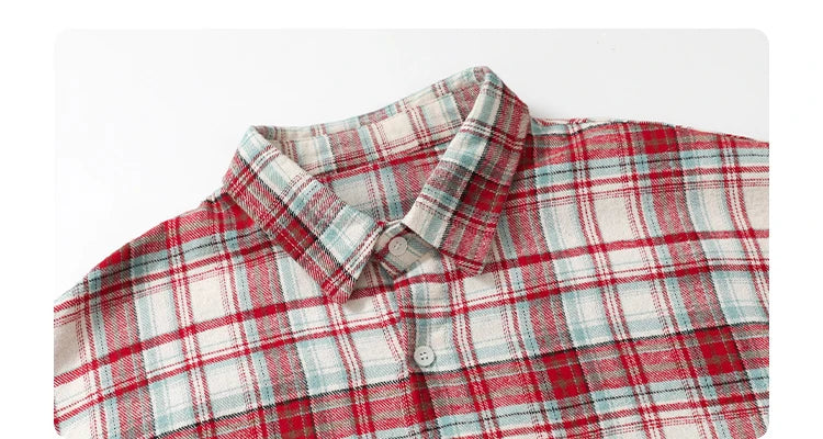 Style yourself in this oversized blue plaid flannel shirt, designed with a relaxed drop-shoulder fit for the perfect grunge-inspired streetwear aesthetic.