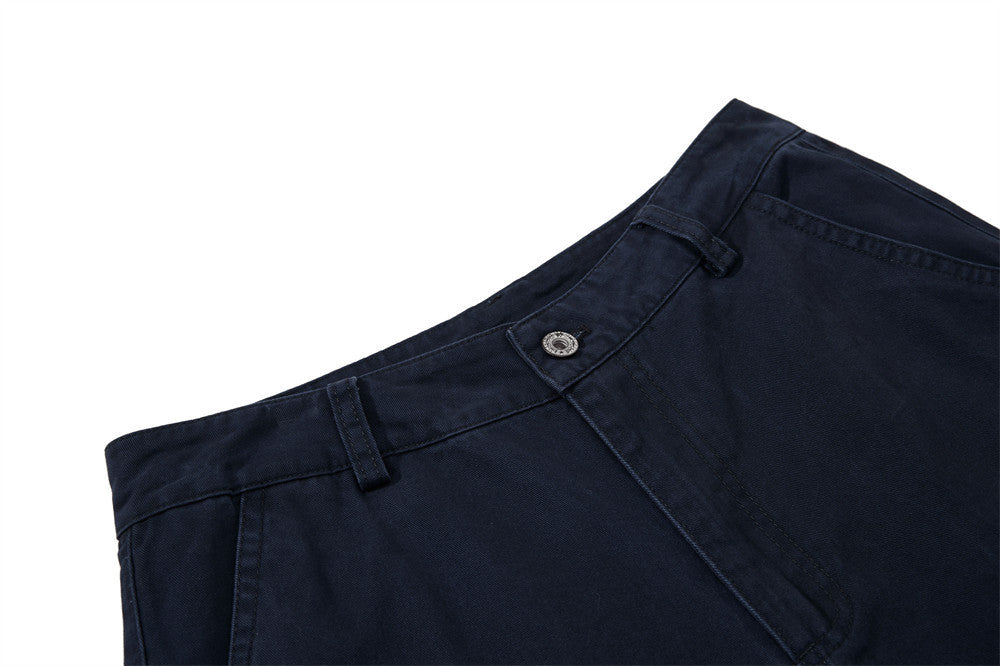 Navy blue pants with a button on a white background