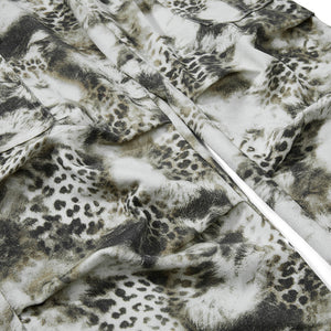 Leopard print fabric with a white background