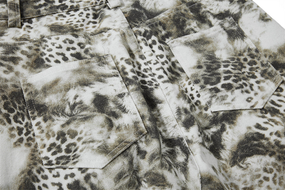 Leopard print fabric swatches in various patterns and shades.
