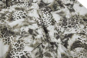 Leopard print fabric swatches in various patterns and shades.