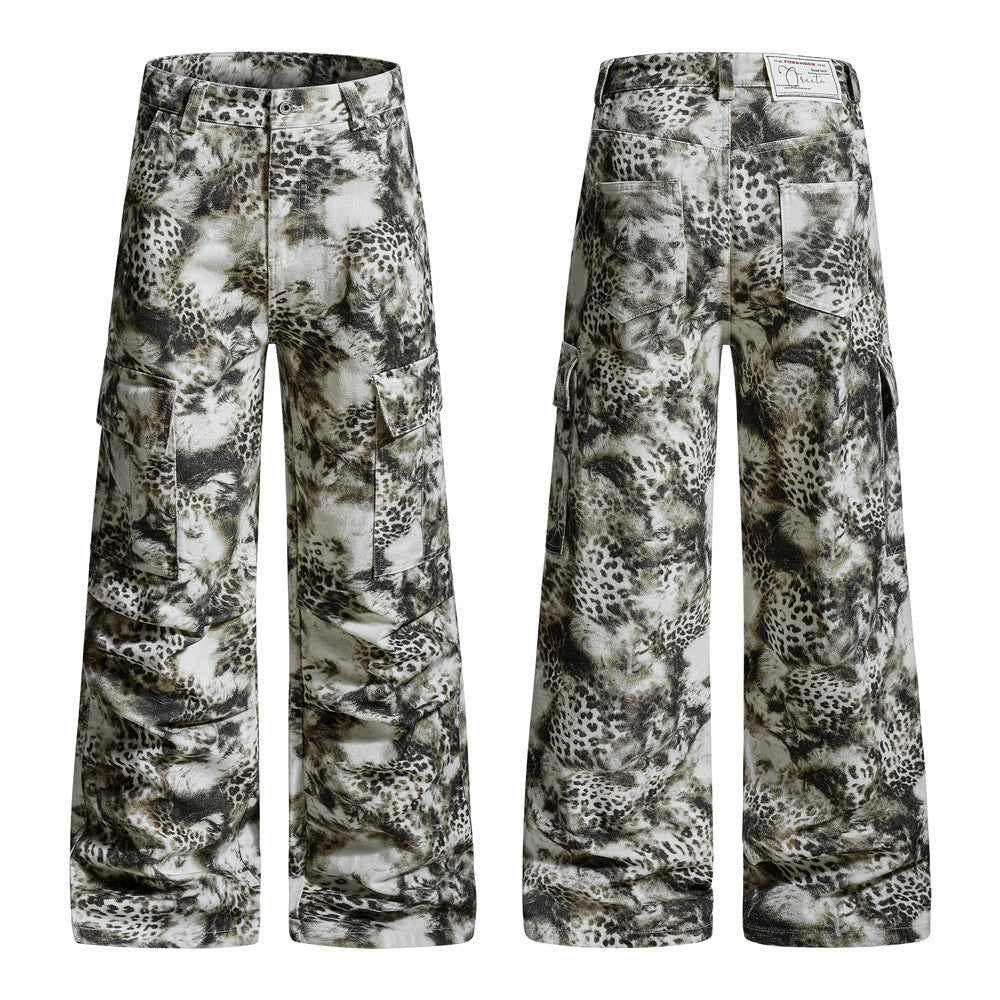Pair of camouflage pants with a pattern of animals on a white background