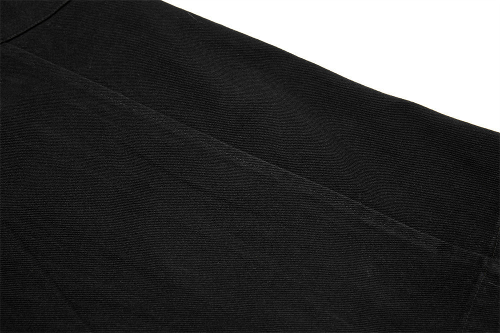 Close-up of black fabric texture on a white background