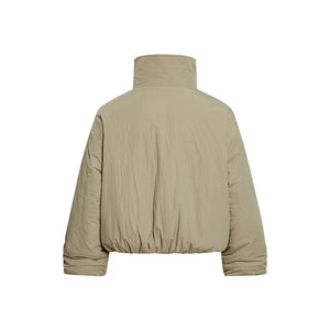 Beige puffer jacket on a white background