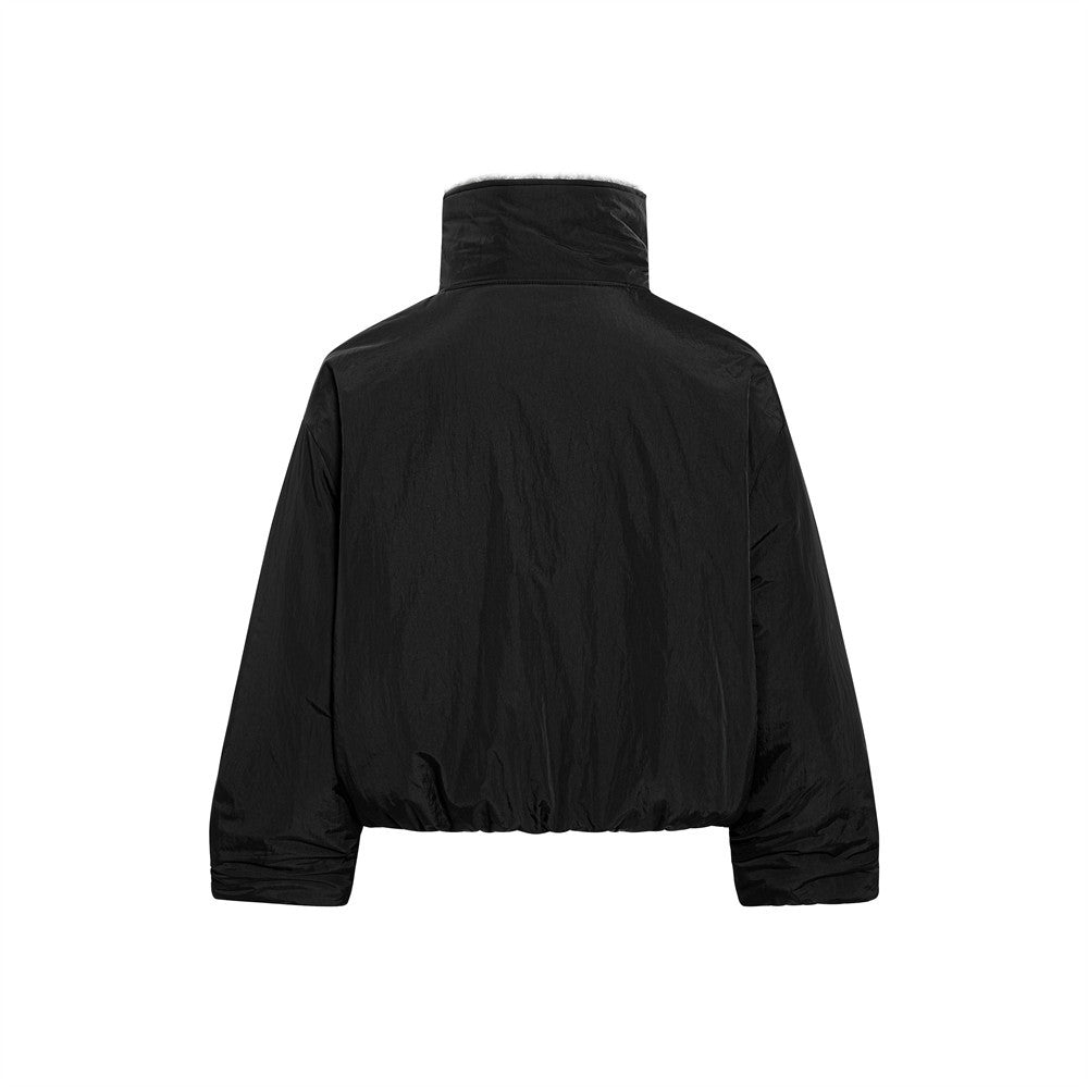 Black jacket shown from the back on a white background